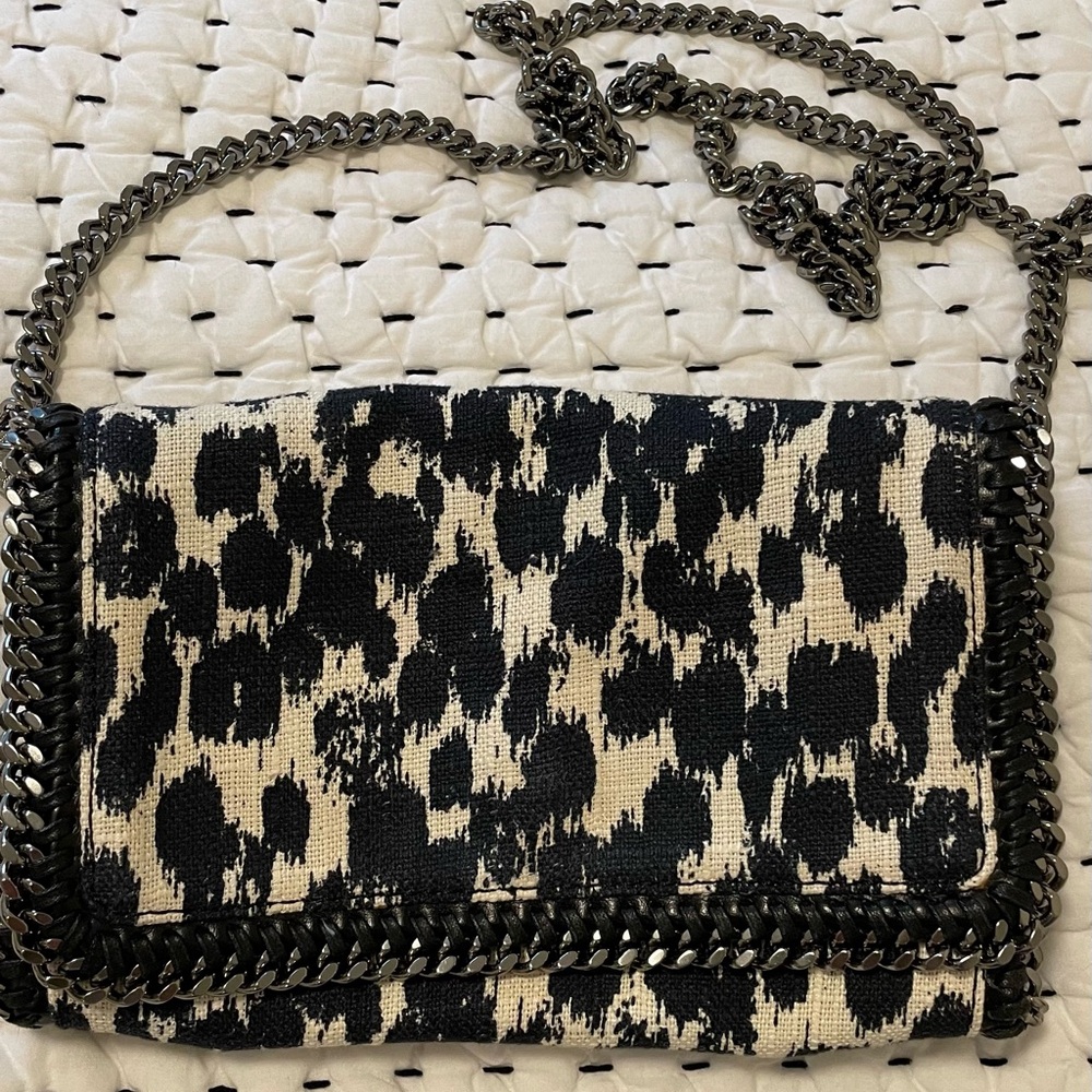 Falabella extra small crossbody bag in black and white print.